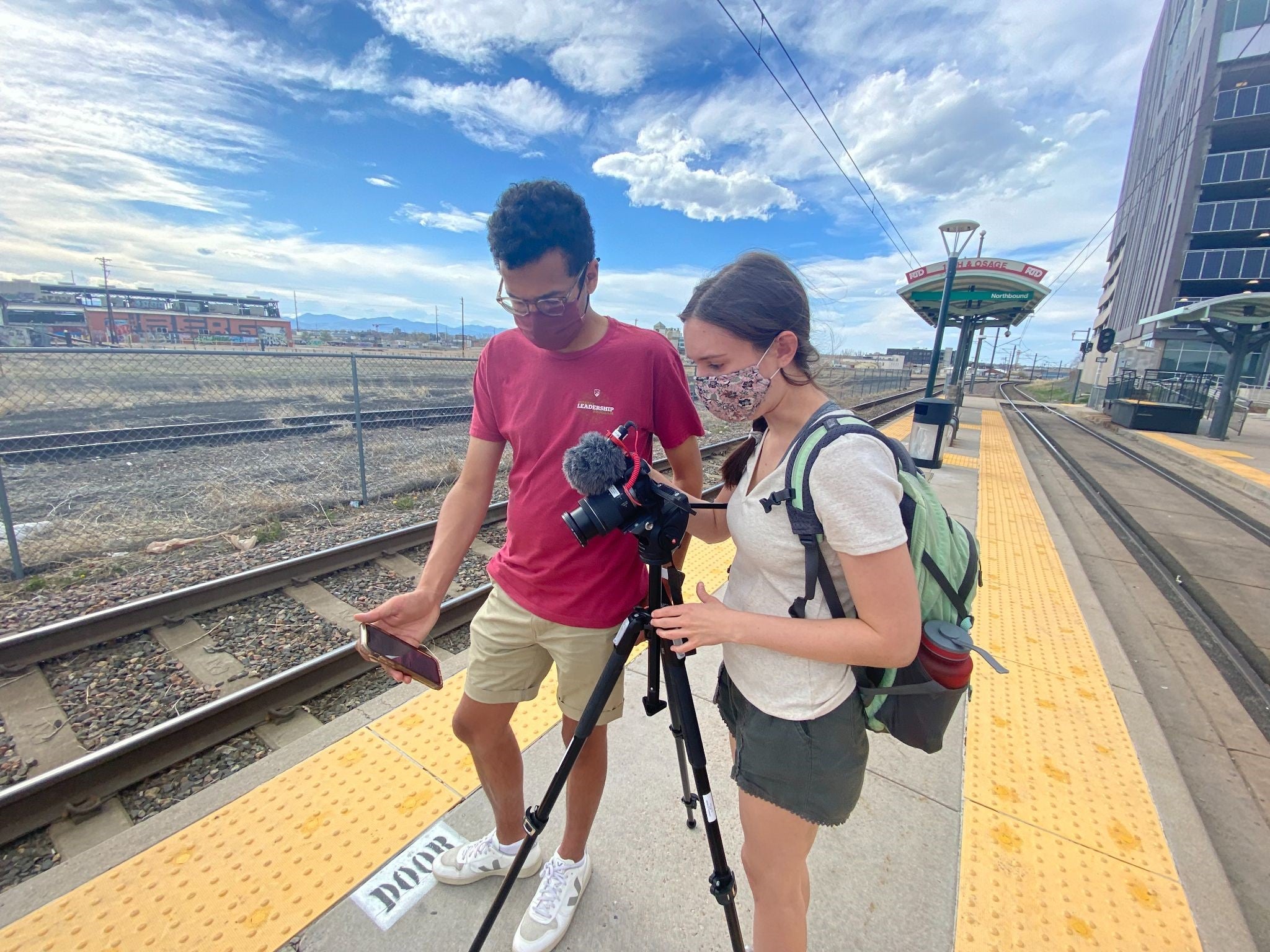 two students using video camera